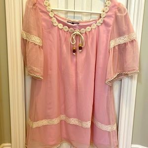 Pink colour, two pieces top in excellent condition. Made in Japan.